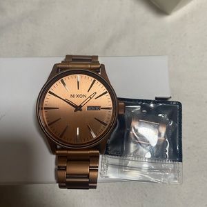 Men’s Nixon Copper colored watch